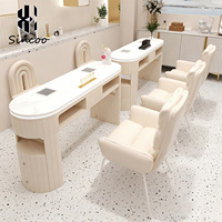 Table de manucure double avec plateau en marbre blanc et chaise, pour salon de beauté de luxe, avec éclairage et aspirateur de poussière