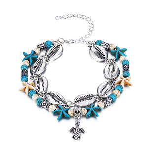 Chevillères de plage bohèmes double couche avec chaîne en coquillages cauris argentés, étoiles de mer turquoise et tortues marines, bijoux de pied pour les vacances - Product Image 6