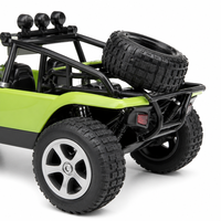 Voiture télécommandée RC Desert Buggy verte avec pneus tout-terrain surdimensionnés, cage de sécurité, fonction 'Suivez-moi' 50m, prête à l'emploi, modèle intérieur/extérieur, pour les 5-14 ans, en métal, échelle 1:12