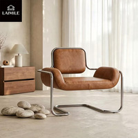 Fauteuil de loisirs vintage en cuir de style mid-century, base en métal chromé, fauteuil rembourré pour villa et hôtel, espace public