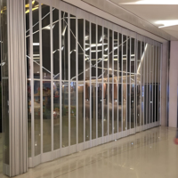 Porte commerciale antivol ignifuge durable Porte pliante coulissante hautement transparente pour affichage 24 heures sur 24 Salon extérieur
