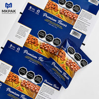 Rouleau de film plastique métallisé imprimé en héliogravure pour l'emballage de sachets de bonbons aux cacahuètes, de chocolat et de snacks