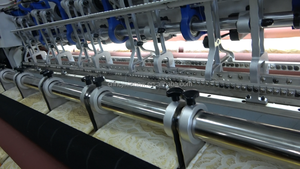 A quilting machine with multiple stitches for quilting the edge fabric of the quilted mattress - Product Image 6