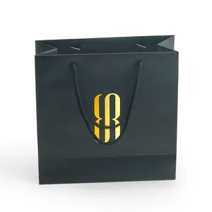 Factory Custom Logo Luxury Design Recycled Material Shopping Paper Bag for Cosmetic Products Packaging