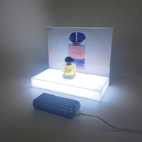 Stands de présentation de comptoir de table en acrylique avec éclairage LED moderne personnalisé pour les magasins de détail et l'utilisation cosmétique