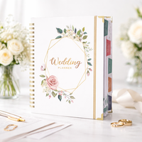 Carnet de planification de mariage OEM avec couverture blanche et motifs floraux, fabriqué par le fabricant