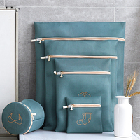 Conçu par OEM pour le voyage du linge en maille pliante Machine à laver Sac à fermeture éclair Panier à logo personnalisé Grand panier à linge en maille avec logo