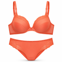 Ensemble de lingerie femme corail orange avec soutien-gorge push-up et culotte classique en dentelle, motif floral brodé, effet liftant et lissant sur les côtés, tendance