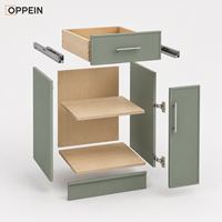 Ensemble d'armoires de cuisine modernes OPPEIN en vert sauge, style Shaker, à assembler soi-même, pour les constructeurs, les logements multi-familiaux et les fournisseurs de services de construction
