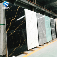 Feuille de PVC marbrée 3D à haute brillance facile à installer Panneau mural de décoration en PVC de 3mm d'épaisseur avec revêtement UV
