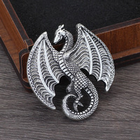 Broche vintage en métal représentant un dragon viking