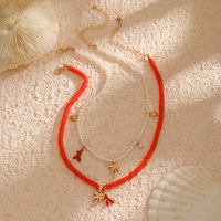 Collier tendance multi-couches en laiton plaqué or avec pendentif étoile de mer et coquillage pour femme UIONEN 1392
