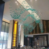 Bâtiment d'hôtel personnalisé en pierre claire décorative suspension lustre en verre d'art de luxe de plafonnier