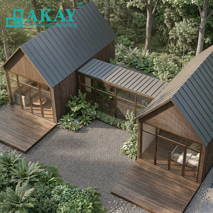 Maisons préfabriquées modernes de luxe en conteneurs, fabriquées en Chine, avec grandes fenêtres et terrasse ouverte, pour projets de villas de villégiature haut de gamme et d'hébergements touristiques. - Product Image 1