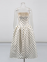 Robe élégante rétro à pois de style français populaire pour l'été