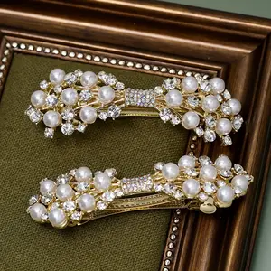 Mujeres cabeza joyería diamantes de imitación perlas pasadores para el cabello mariposa diamante pelo agarre diseño coreano lazo Clip para el cabello para mujeres niñas