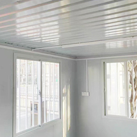 Maison conteneur de bureau mobile de 20 pieds pour chantiers de construction en bois avec panneau sandwich en acier pour salle de bain et cuisine pour chambre à coucher
