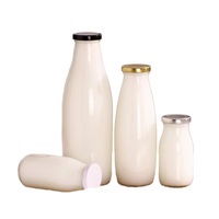 Bouteille en verre transparent mat incassable personnalisée avec couleur personnalisée pour les boissons au lait, au jus, au thé et au café, bouchon à vis