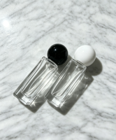 Vente en gros de flacons de parfum vides en verre de 30 ml, flacon de parfum rectangulaire transparent avec bouchon sphérique noir pour Cologne