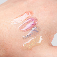 Gloss à lèvres en tube à marque privée avec effet arc-en-ciel bicolore vibrant et formule de gel brillant biologique, gloss à lèvres scintillant