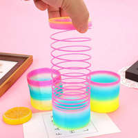 Jouet éducatif unisexe arc-en-ciel en forme de cercle 6,5*6CM, boîte colorée, vente en gros, jouet magique Slinky pour enfants, ressort en plastique classique, cadeaux