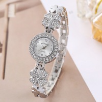 Nouvelle montre de luxe pour femmes, mode, trèfle porte-bonheur, montre à quartz avec strass, montre habillée pour filles, femmes, bracelet tout-aller