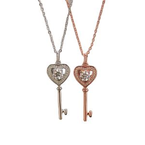 Collana con catena a clavicola del <span class=keywords><strong>palazzo</strong></span> con ciondolo in oro rosa con chiave in oro bianco 18 carati per regalo di natale personalizzato - Product Image 1