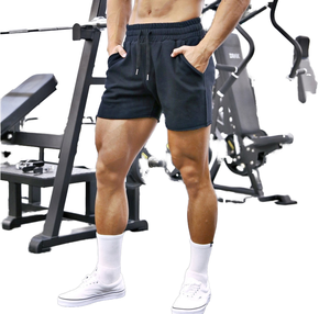 กางเกงขาสั้นผู้ชายแบบสปอร์ตสีพื้น ผ้าซับเหงื่อ ระบายอากาศได้ดี ผ้าผสมโพลีเอสเตอร์/คอตตอน ยับยาก เป็นมิตรกับสิ่งแวดล้อม ขายส่ง - Product Image 2