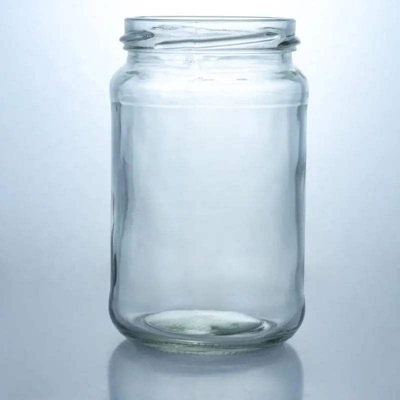 Frasco de vidrio transparente de alta calidad hecho a medida tarros de miel fabrica de alimentos al por mayor
