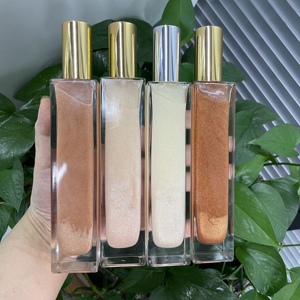 Huile corporelle scintillante à base d'eau MLM OEM ODM 100ml, flacon cylindrique avec capuchon doré, illuminateur liquide, vente en gros, illuminateur corporel, éclaircissant pour la peau - Product Image 2