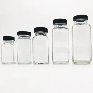 热卖2盎司60毫升透明玻璃方形法国迷你瓶，带塑料螺旋盖，用于果汁饮料