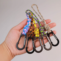 Lanière porte-clés portable tressée à la main à sept brins, anti-perte, avec crochet de fixation rapide multifonctionnel pour camping et randonnée