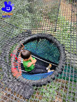 Structure de jeu gonflable commerciale d'extérieur avec filet de trampoline, grande capacité, attraction de terrain de jeu aérien