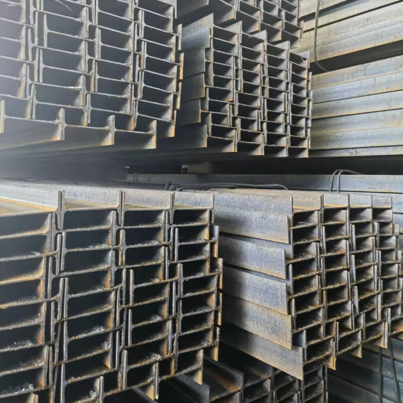 Prezzo di alta qualità di fabbrica 12m acciaio strutturale laminato a caldo ASTM JIS ferro carbonio I-Beams H Beam Steel