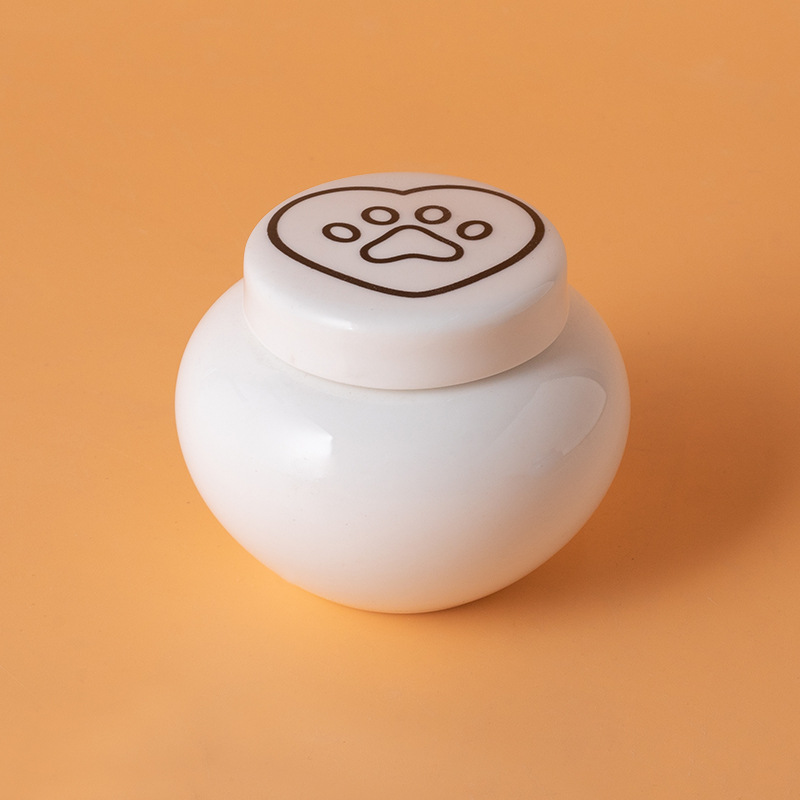 Round ash urn-white-black heart paw print