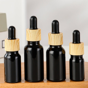 1oz 2oz 5ml 10ml 15ml <span class=keywords><strong>20ml</strong></span> 30ml 50ml 100ml mờ màu xanh lá cây màu xanh hổ phách rõ ràng tinh dầu chai thủy tinh nhỏ giọt với nắp tre - Product Image 6