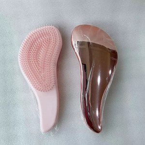 Spazzola Magica Elettrica Rosa in Nylon Morbido con Finitura Opaca per Districare le Extension dei Capelli con Logo Personalizzato - Product Image 5