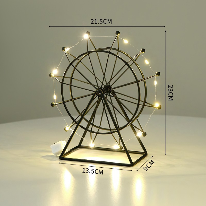 Grande roue trompette noire avec de nouveaux éclairages.