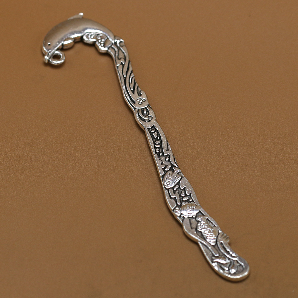 Marcador de forma de delfín