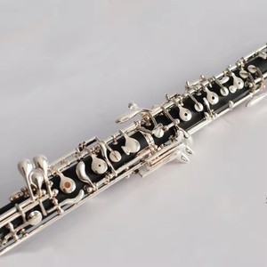 <span class=keywords><strong>Instrument</strong></span> <span class=keywords><strong>hautbois</strong></span> en bakélite 17 touches plaqué argent à très bon <span class=keywords><strong>prix</strong></span> - Product Image 2