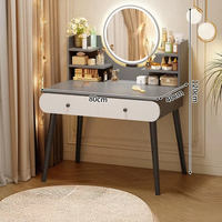Table de toilette de chambre à coucher minimaliste moderne avec miroir éclairé réglable, tiroirs de rangement et table de maquillage intégrée
