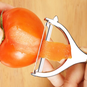 Éplucheur multifonction en acier inoxydable pour légumes et fruits avec poignée en silicone pour une utilisation en cuisine - Product Image 5
