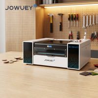 Découpeuse laser CO2 Jowuey 7050 pour textiles, acrylique, bois et caoutchouc, zone de travail 700x500mm, refroidissement par eau, modèle de table