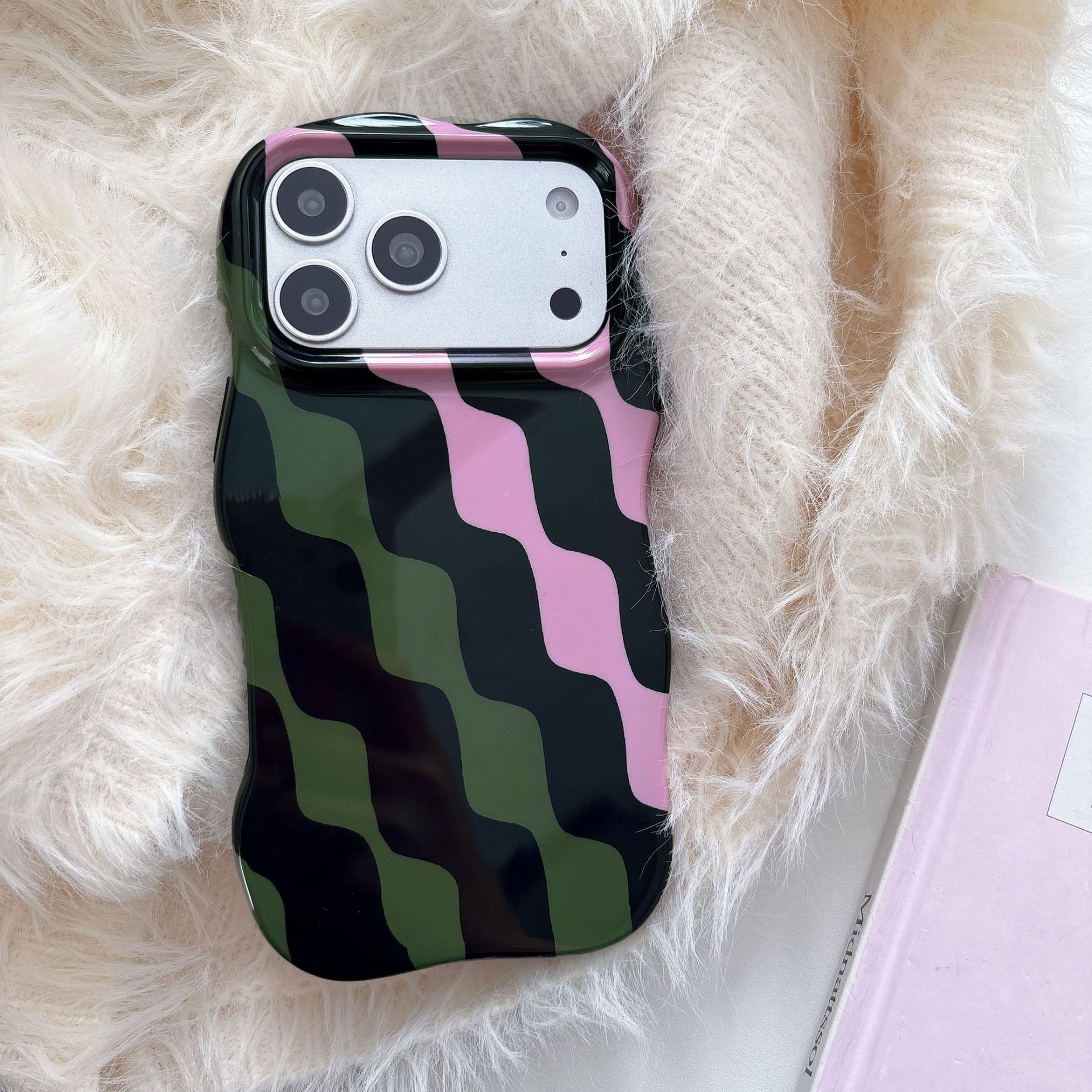 Wavy film green, pink, and black waves