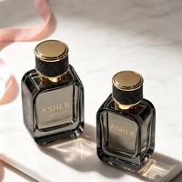 Flacon de parfum en verre à coins arrondis de 50 ml avec logo personnalisé, bouchon doré matelassé, base épaisse, conteneur de parfum vide avec boîte cadeau noire