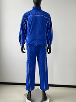Conjunto Deportivo Personalizado de Fábrica OEM con Franjas Reflectantes, Chaqueta con Cierre y Pantalones de Nailon, Traje Deportivo Cortavientos Personalizado