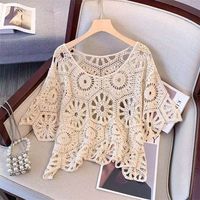 Pull en tricot vintage ajouré à col rond et manches courtes amincissant