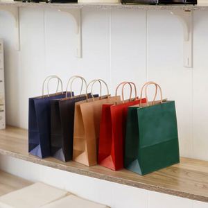 Wholesale Customized Printed Logo Recyclable Colored Kraft Paper Shopping Bags for Packaging and Gift Giving - Product Image 1