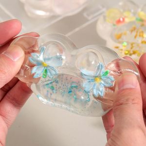 NOUVEAU Jouet à presser transparent en gelée, motif griffe de chat avec fleur et paillettes - Super rebondissant, écologique, cadeau thérapeutique pour enfants et adultes, jouet de bureau - Product Image 4
