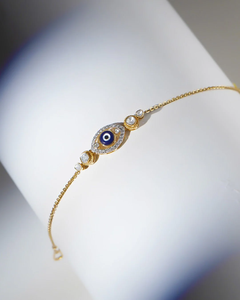 กำไลข้อมือ Evil-Eye Halo สุดหรู กำไลข้อมือเสริมสิริมงคล ดีไซน์สวยงาม ประดับคริสตัลสีน้ำเงิน โทนสีทองพรีเมียม - Product Image 1
